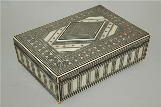 An Indian ivory and sadeli rectangular work box, 11in.